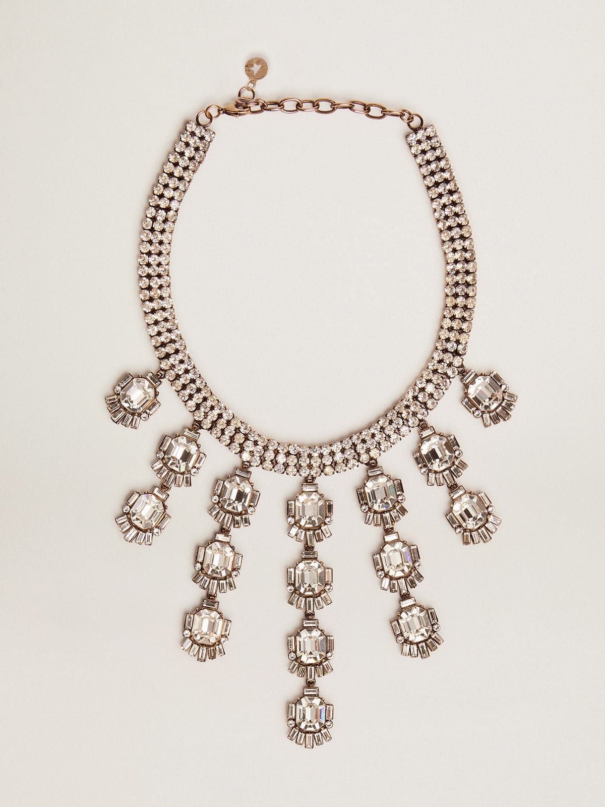 Dco Jewelmates Collection necklace in old gold color with baguette-shaped drop crystals