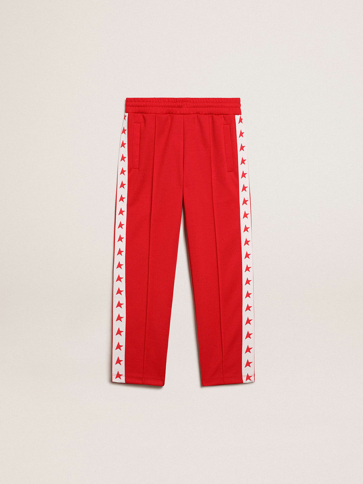 Kids' red joggers with stars on the sides