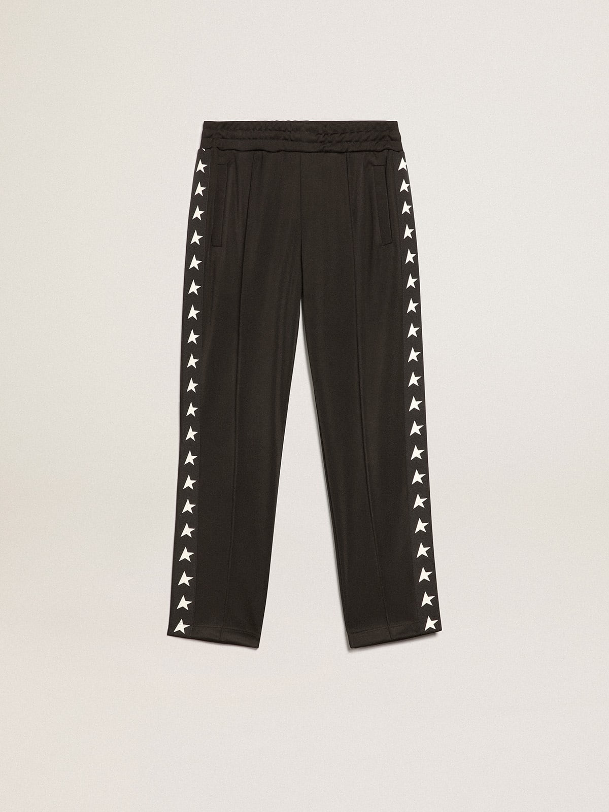 Kids' black joggers with stars on the sides