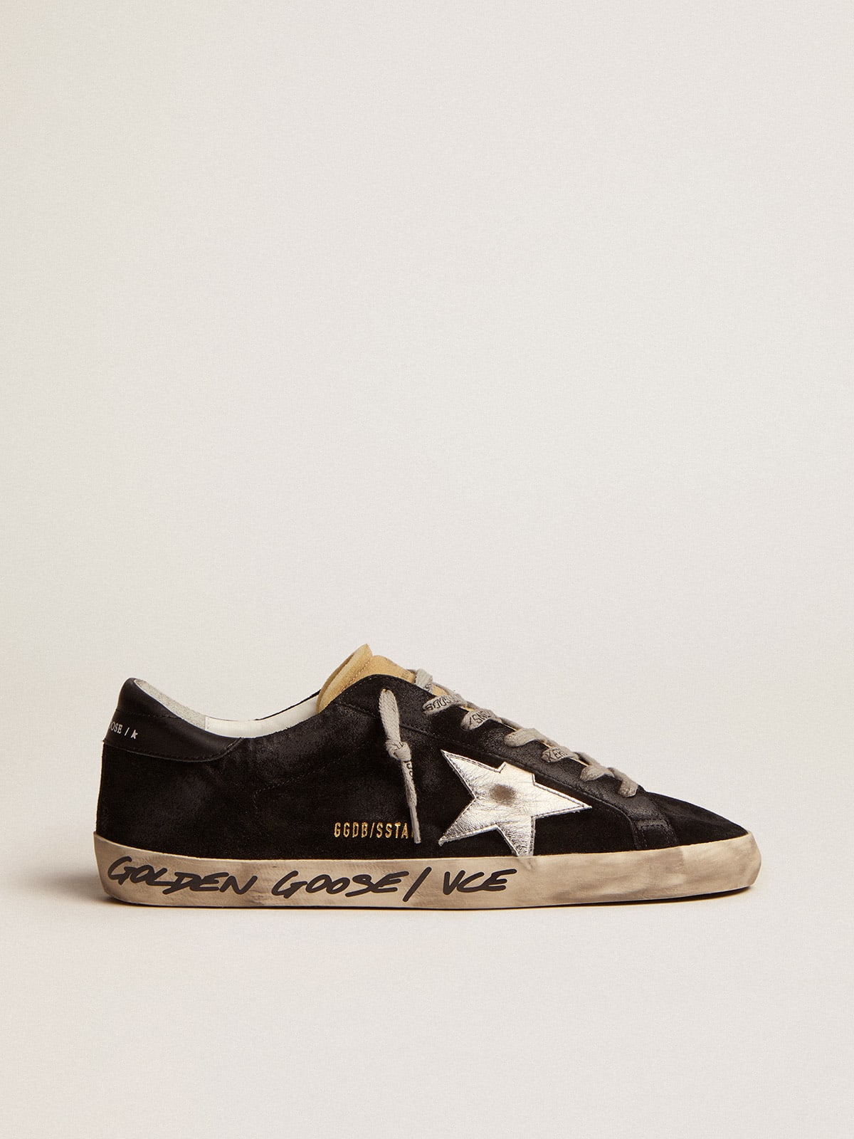 Super-Star sneakers in black suede with silver laminated leather star