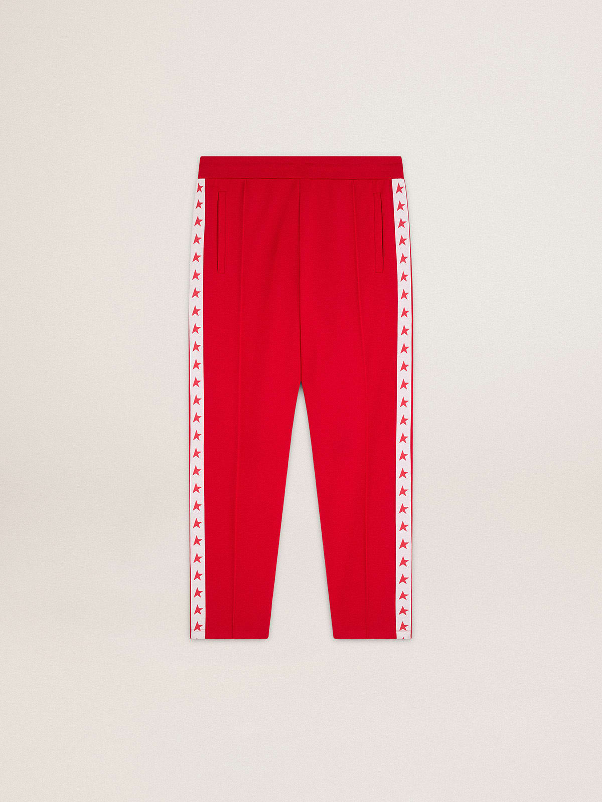 Men's red joggers with red stars on the sides