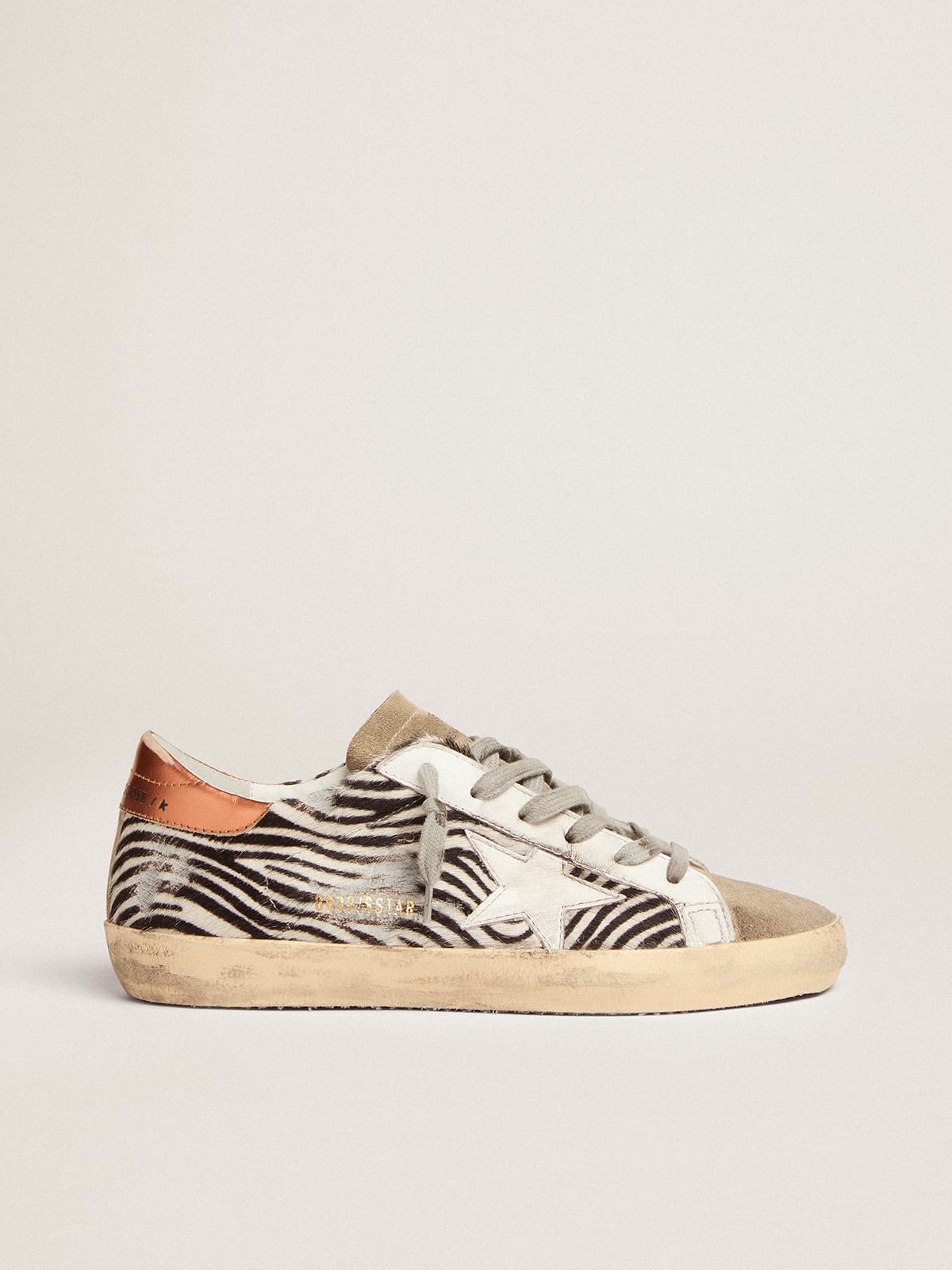 Super-Star LTD sneakers in zebra-print pony skin with white leather star and orange laminated leather heel tab