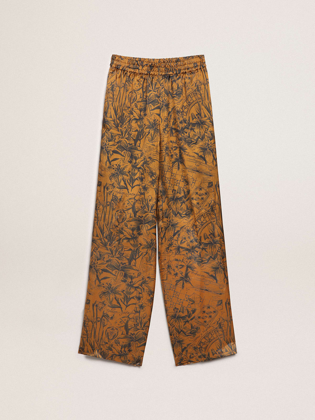 Journey Collection joggers in golden brown with notebook print