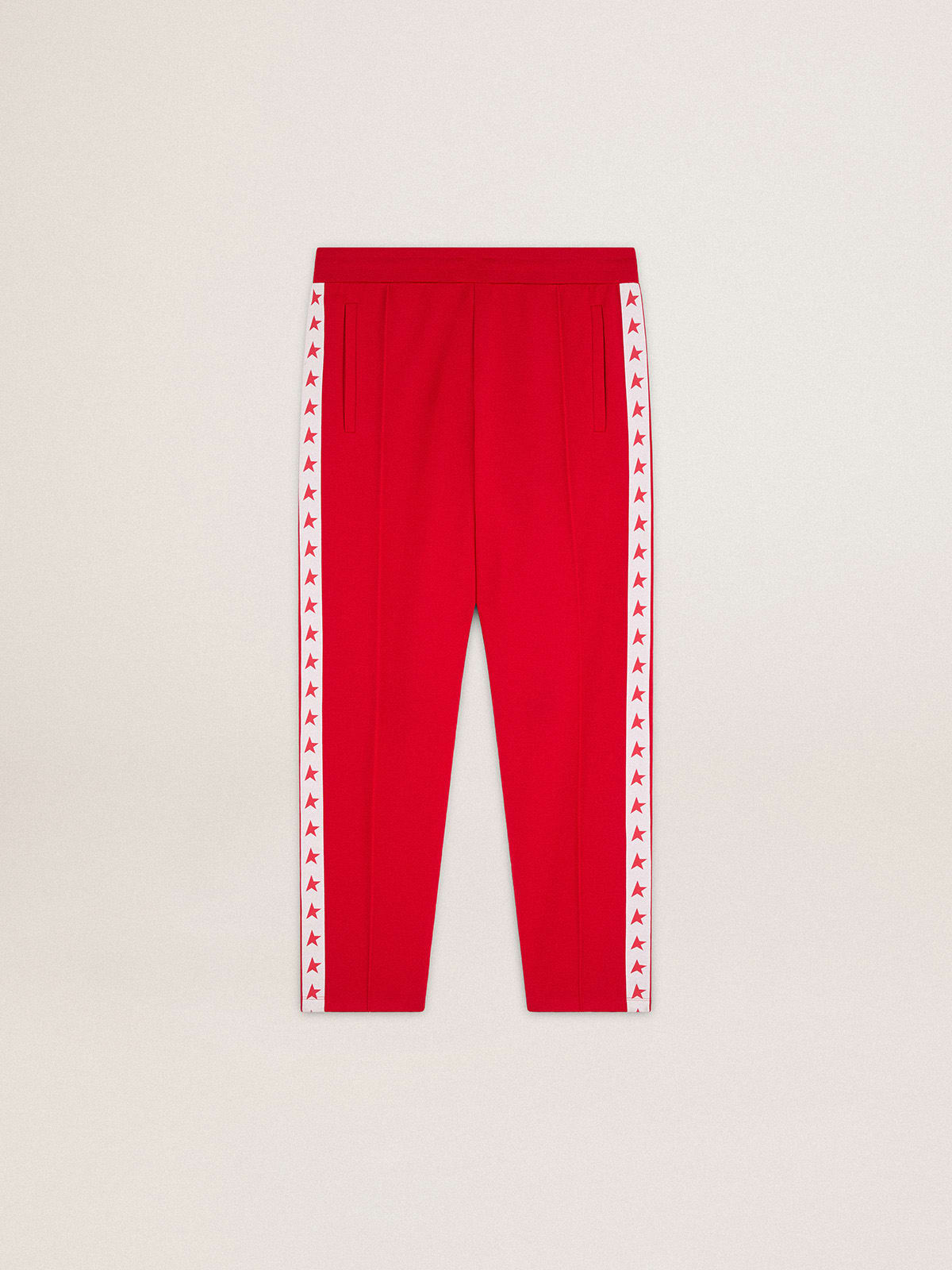 Women's red joggers with red stars on the sides