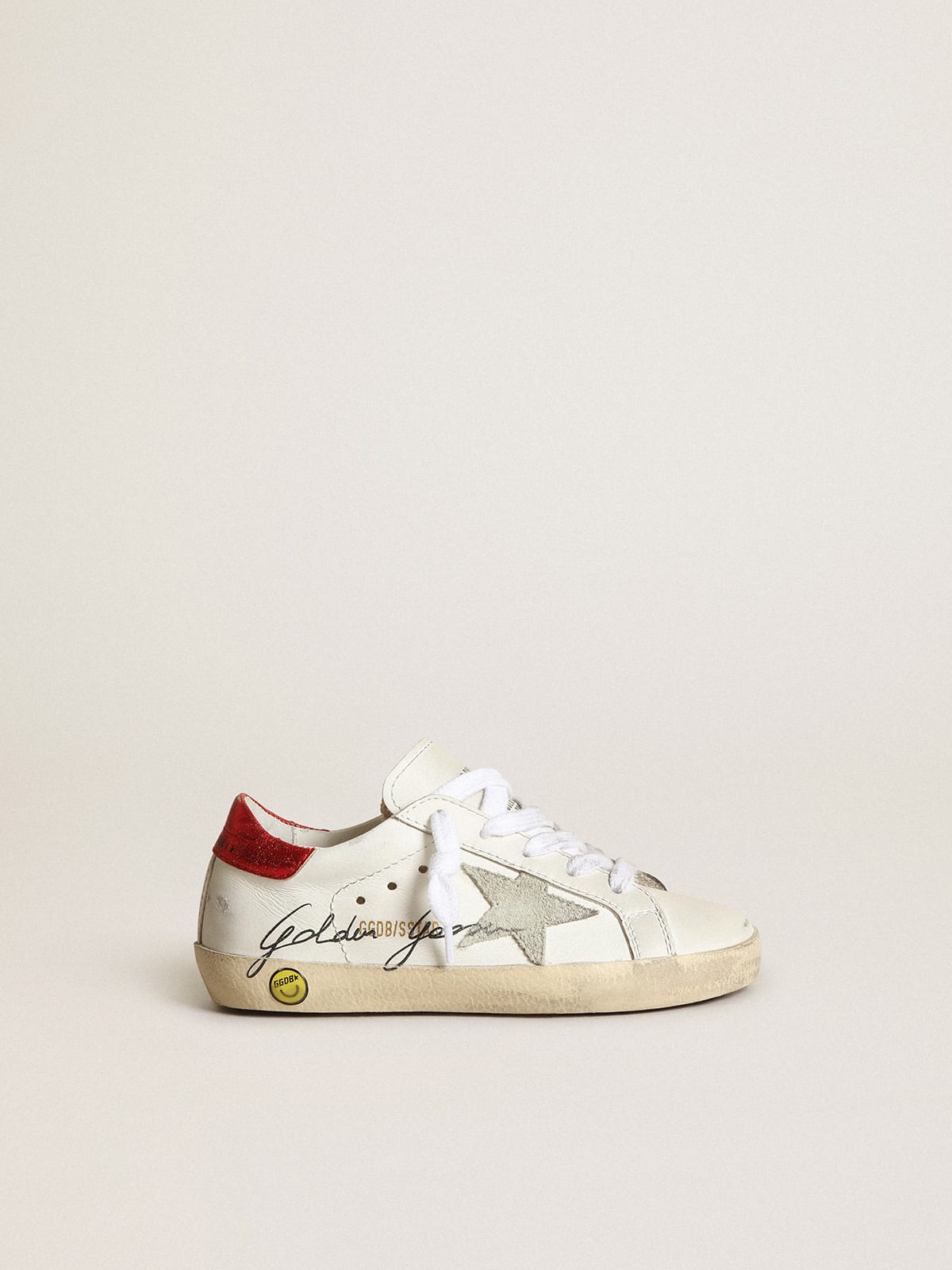 Young Super-Star sneakers with ice-gray suede star and red metallic leather heel tab