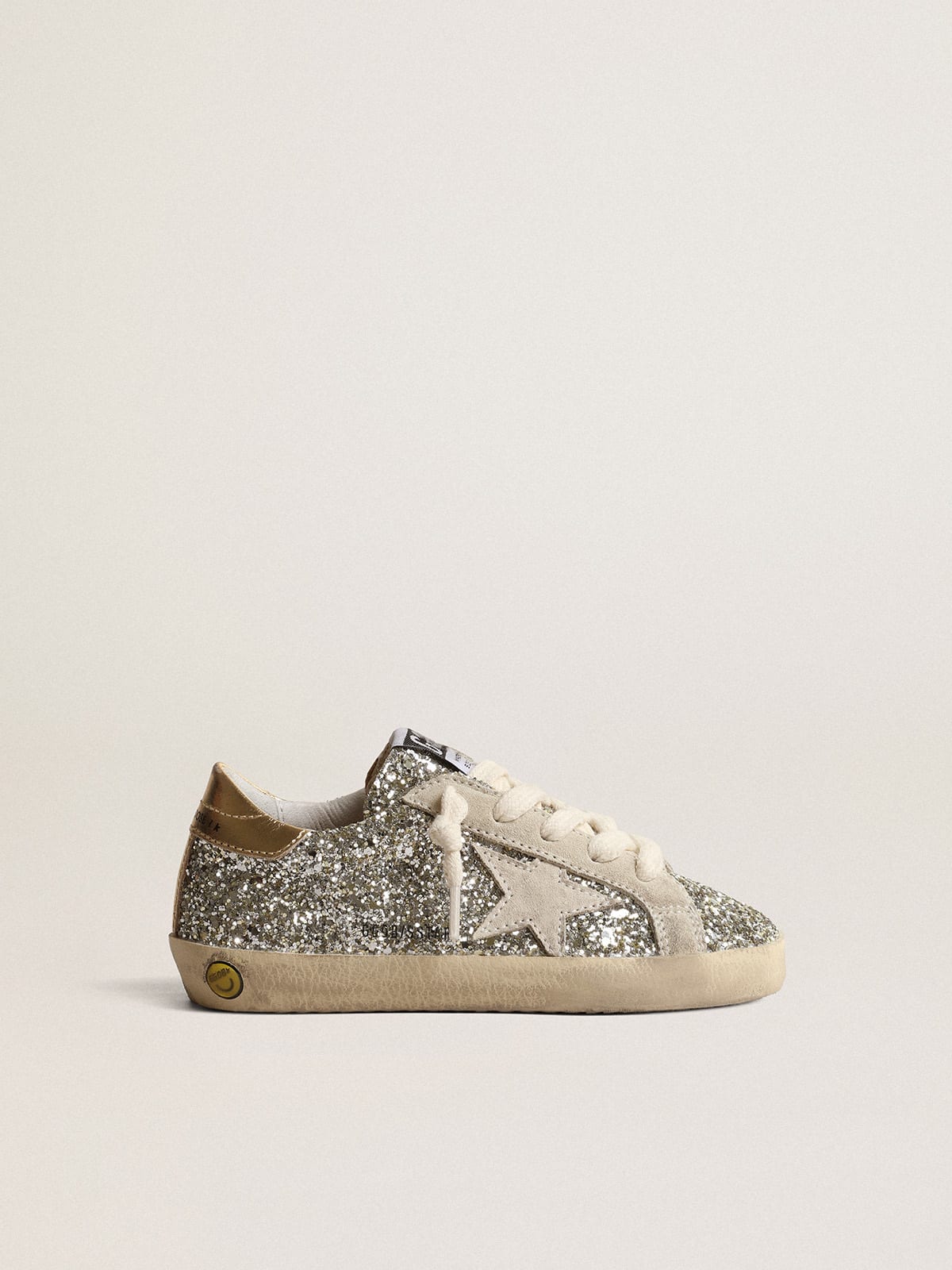 Super-Star Young in glitter with a suede star and gold heel tab